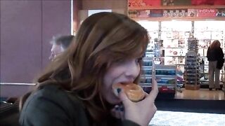 Pretty girl eats donut