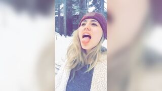 Lia Marie Johnson catching snowflakes with her tongue [gifv]