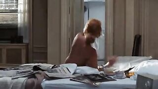 Not much more than side boob but it is Ann-Margret in the 1971 movie Carnal Knowledge