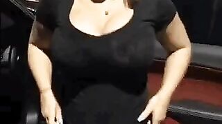 Busty pregnant gal bouncing in the parking lot