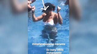 Charly dancing in a pool