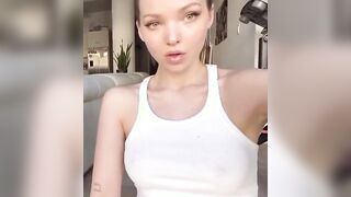 Dove Cameron in a see-through shirt