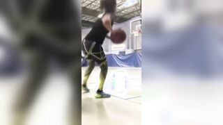 Bayley shooting hoops