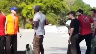 Guy starts fight with a dozen skateboarders and loses.