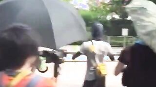 Protestors In Hong Kong Cutting Down Facial Recognition Towers.