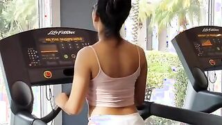 Oxsa Ray's working out on a Treadmill