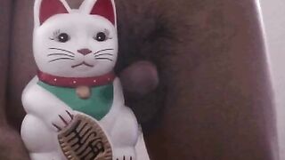 Putting the "man" in "maneki neko"