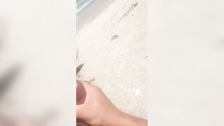 Cumming on the beach