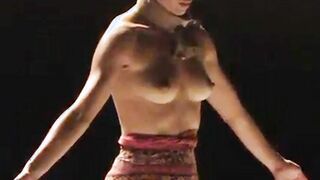 Portuguese performer Maria Fonseca topless on stage