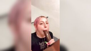 Holly sucking on a big black bull